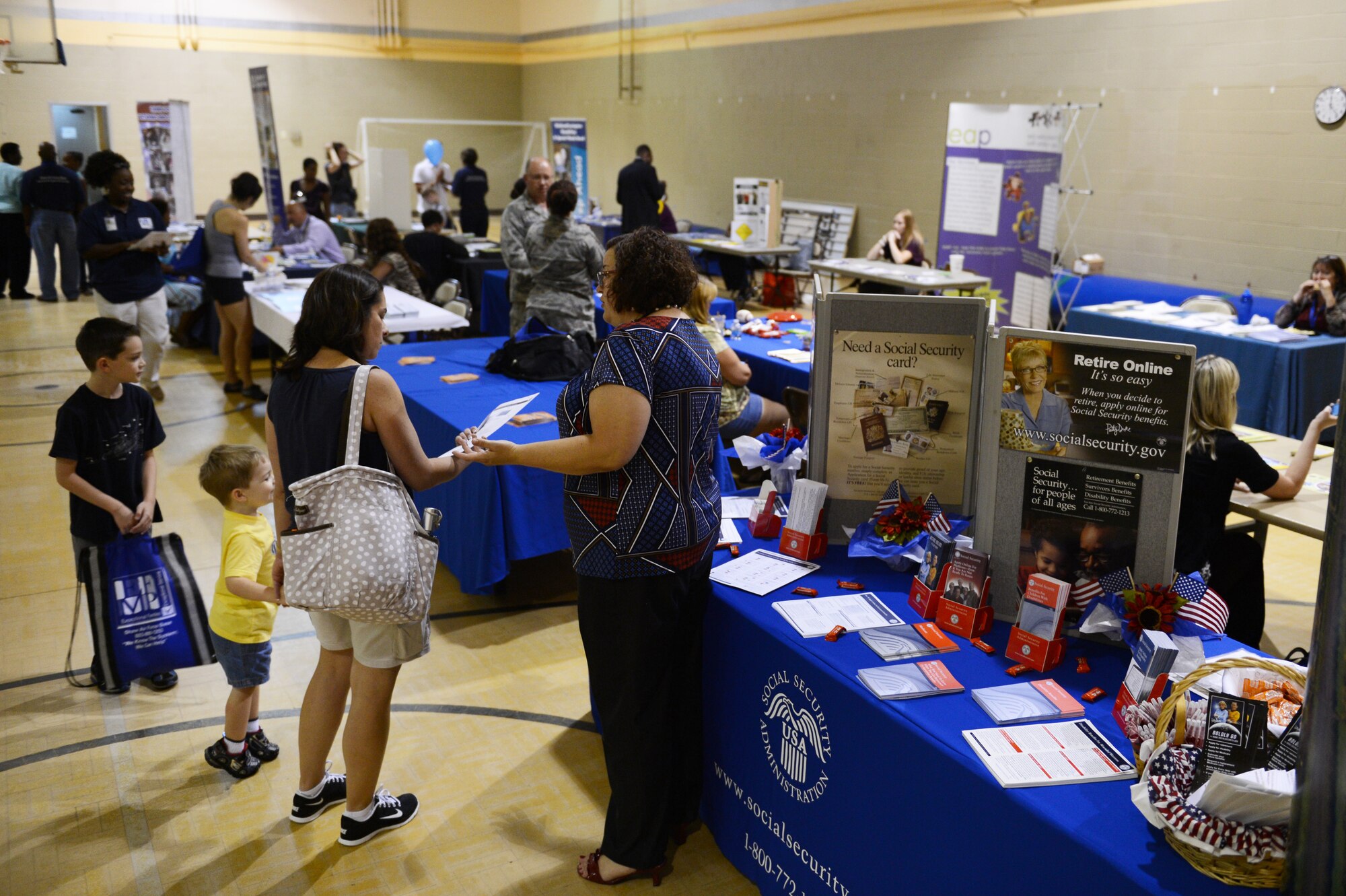 Multiple base units and community partners set up booths displaying the resources they offer families with special-needs children during the Child Find Clinic and Community Resource Awareness Fair at Shaw Air Force Base, S.C., Aug. 14, 2013. To help families discover if their child has  special needs, the fair had a clinic that screened children’s vision, hearing, development and speech skills for deficiencies. (U.S. Air Force photo by Airman 1st Class Krystal M. Jeffers/Released)