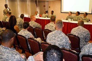 Soldiers with the Fort Eustis Warrior Transition Unit attend a town hall meeting at Fort Eustis, Va., August 15, 2013. During the meeting, Soldiers were able to discuss concerns with U.S. Army Col. Glenda J. Lock, McDonald Army Health Center commander, as well as other leaders from Fort Eustis. (U.S. Army photo by Marlon J. Martin/Released)
