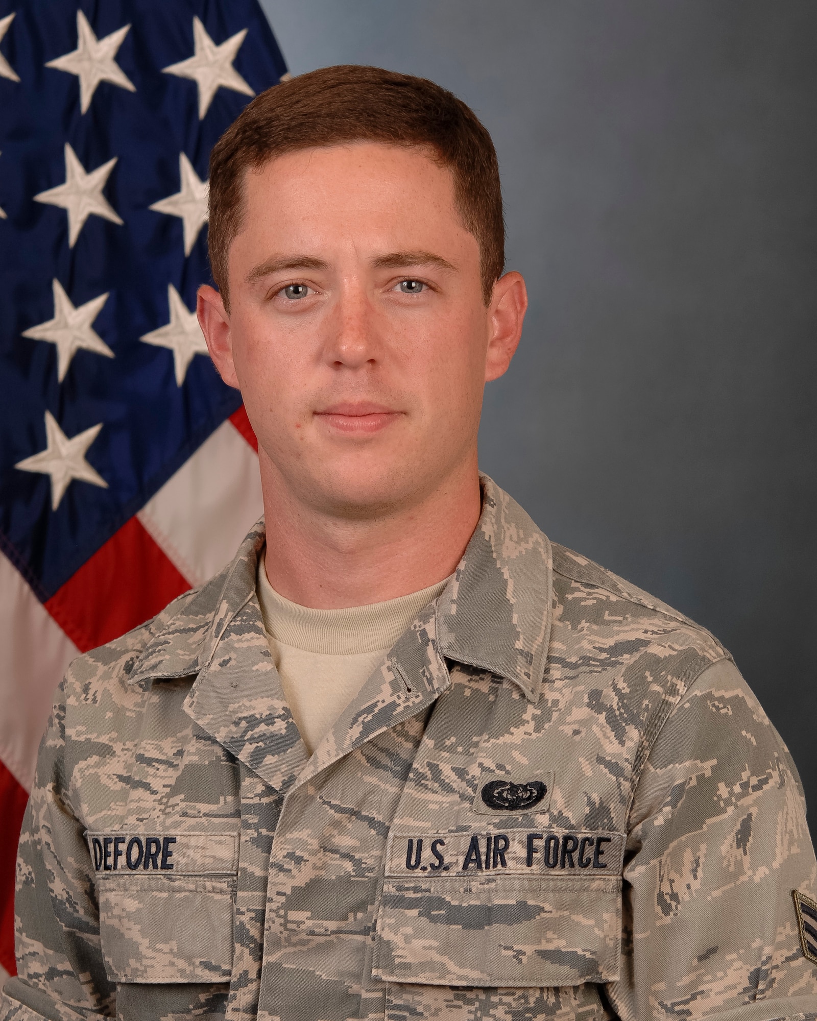 Senior Airman Joey DeFore, with the 116th Air Control Wing, poses for an official photo at Robins Air Force Base, Ga., Aug. 20, 2013.  DeFore along with two bystanders rescued six children from an overturned bus in Warner Robins, Ga., Aug. 15, 2013. The accident is currently under investigation.(U.S. National Guard photo by Tech. Sgt. Regina Young/released) 