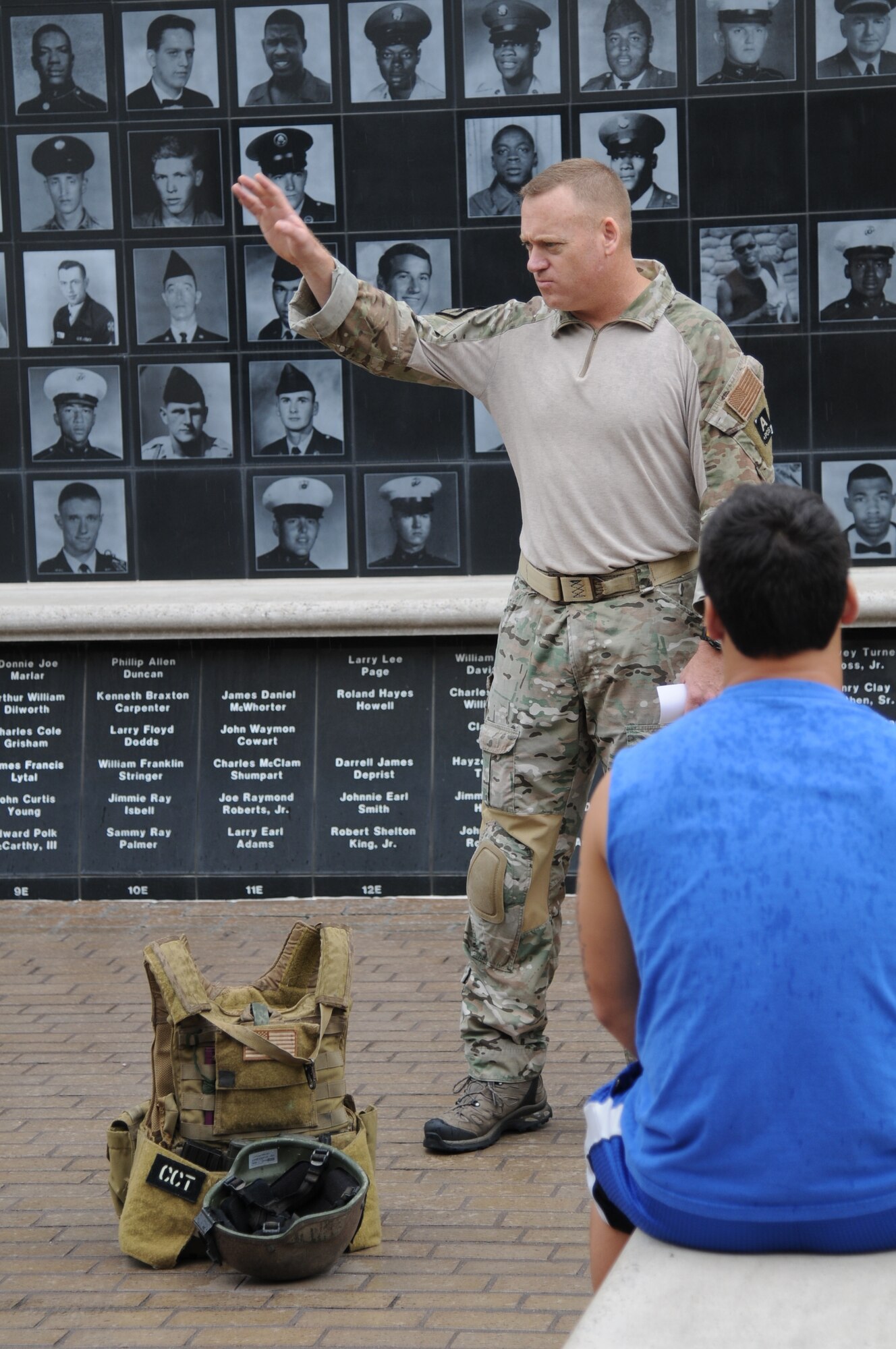 Senior Master Sgt. Bradley Reilly, 334th Training Squadron combat control operators course superintendent, explains the importance of a positive attitude in all situations to St. Martin High School senior football players during a leadership seminar Aug. 17, 2013, at the Mississippi Vietnam Veterans Memorial in Ocean Springs, Miss. The seminar was a collaboration of the St. Martin Gridiron Club and Keesler personnel, who also briefed the seniors on good attitudes, values, beliefs and teamwork.  (Courtesy photo by Kemberly Groue) 