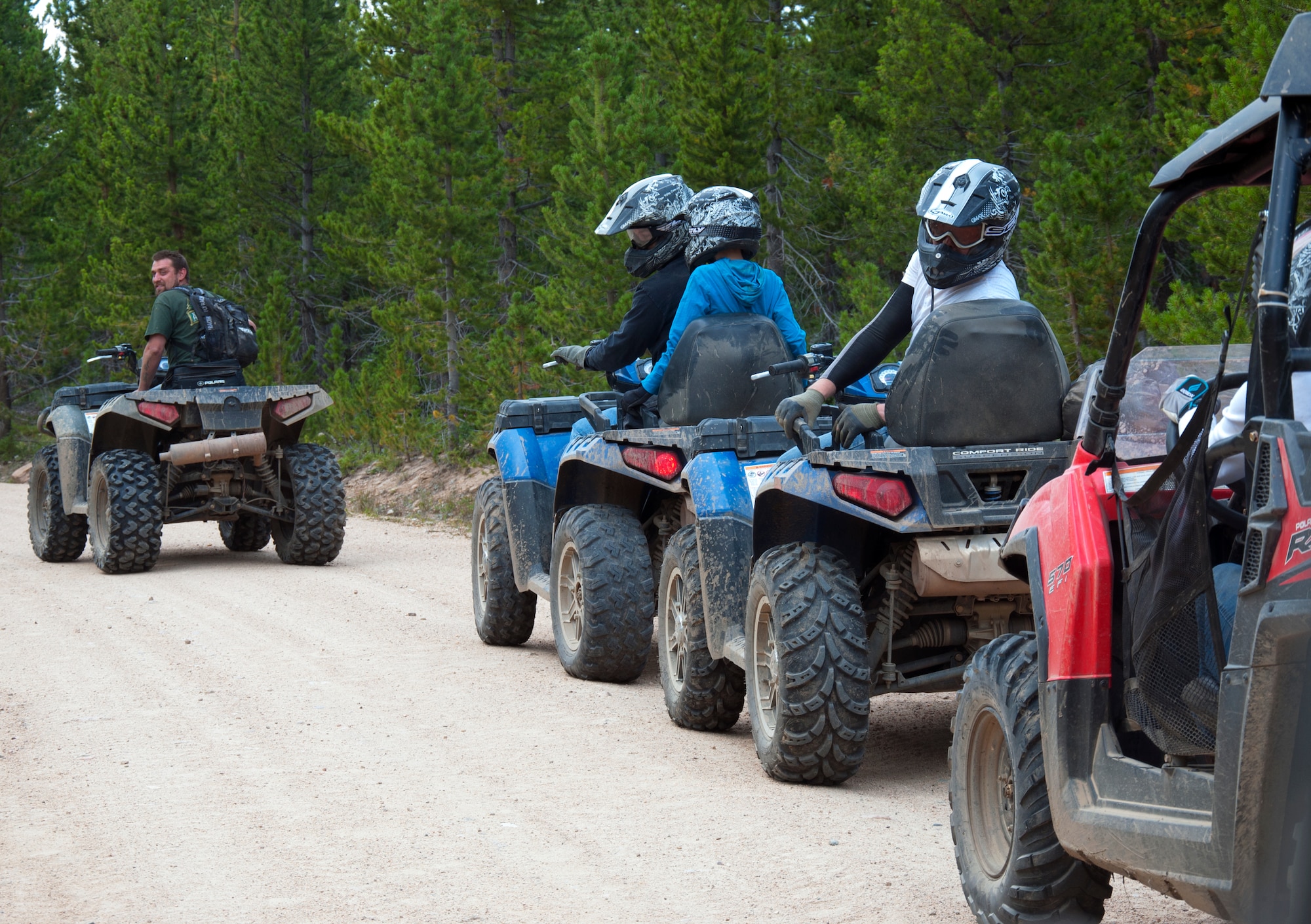 130817-F-GZ967-021 Shane, a tour guide from Albany Lodge, prepares to lead the group of riders into the trails of Albany Lodge, Albany, Wyo. Shane was hired to by Outdoor Recreation to lead the group through the trails. (U.S. Air Force photo by Airman 1st Class Brandon Valle)