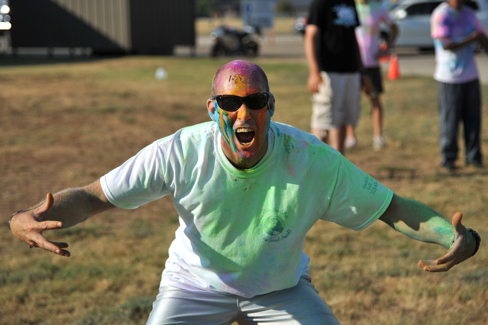 GOODFELLOW AIR FORCE BASE, Texas-- Army Sgt. 1st Class Kenneth Vinoski, 344th Military Intelligence Battalion, poses for a photo after the Sexual Assault Prevention and Response Color Race messiest person contest on Kiowa Trail Aug 17. The SAPR Color Race was held to help bring awareness to preventing and responding to sexual assaults. (U.S. Air Force photo/ Senior Airman Michael Smith) 
