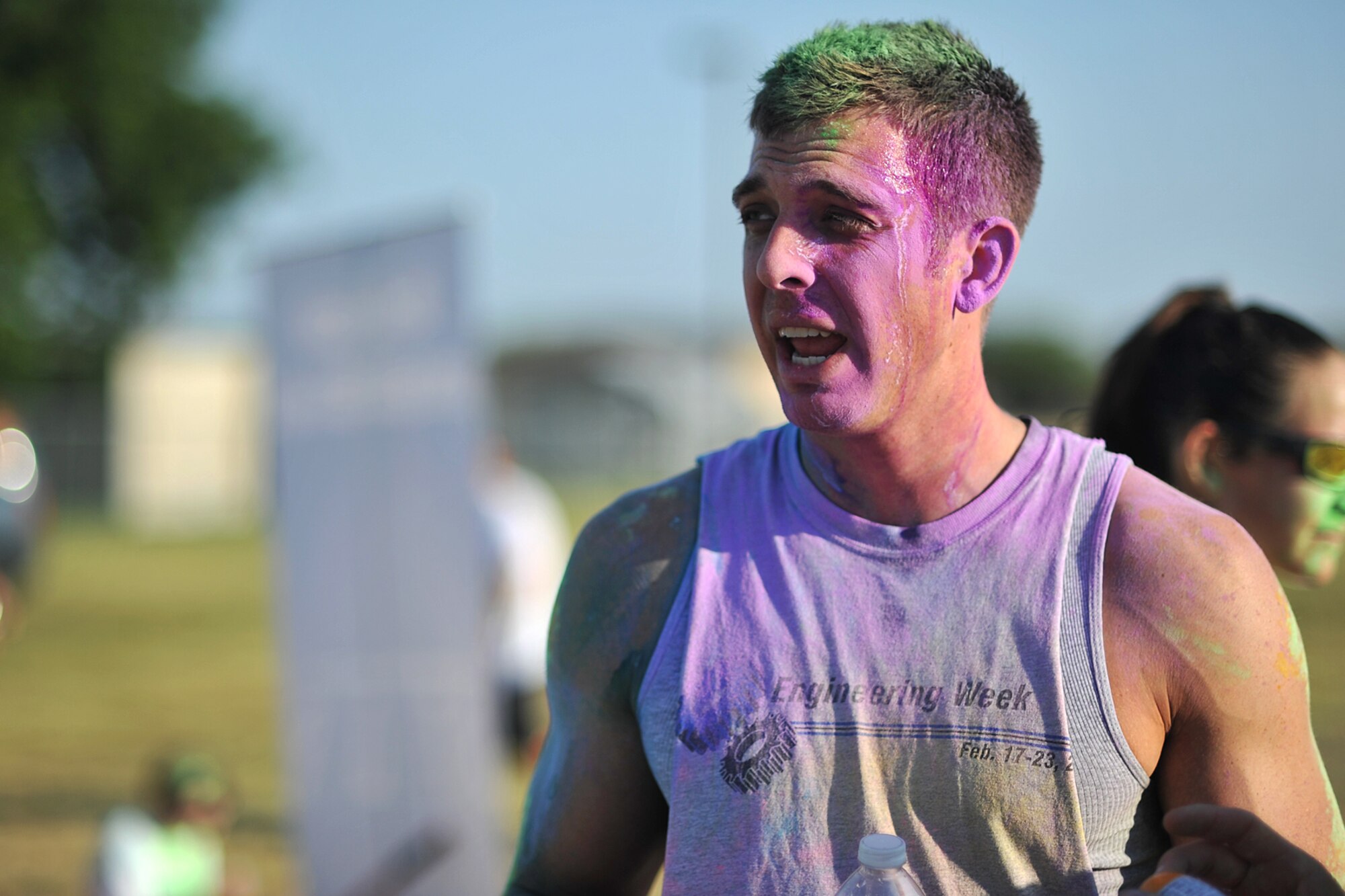 GOODFELLOW AIR FORCE BASE, Texas-- 2nd Lt. Matt Crider, 315th Training Squadron student, waits at the finish line after running the Sexual Assault Prevention and Response Color Race on Kiowa Trail Aug 17. Each participant of the race ran through several color stations where colored powder would be thrown. (U.S. Air Force photo/ Senior Airman Michael Smith) 