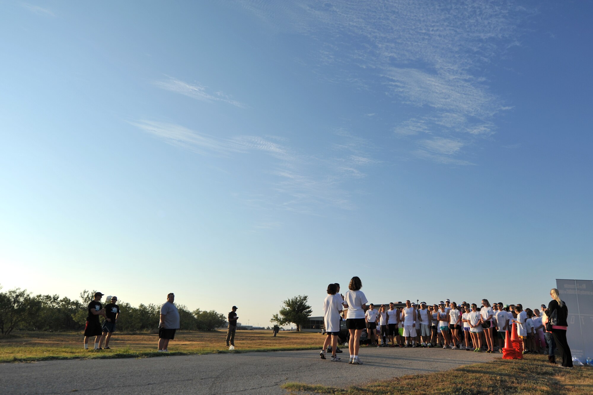 GOODFELLOW AIR FORCE BASE, Texas-- Participants of the Sexual Assault Prevention and Response Color Run line up at the starting line on Kiowa Trail Aug 17. The SAPR Color Race was held to help bring awareness to preventing and responding to sexual assaults. (U.S. Air Force photo/ Senior Airman Michael Smith) 