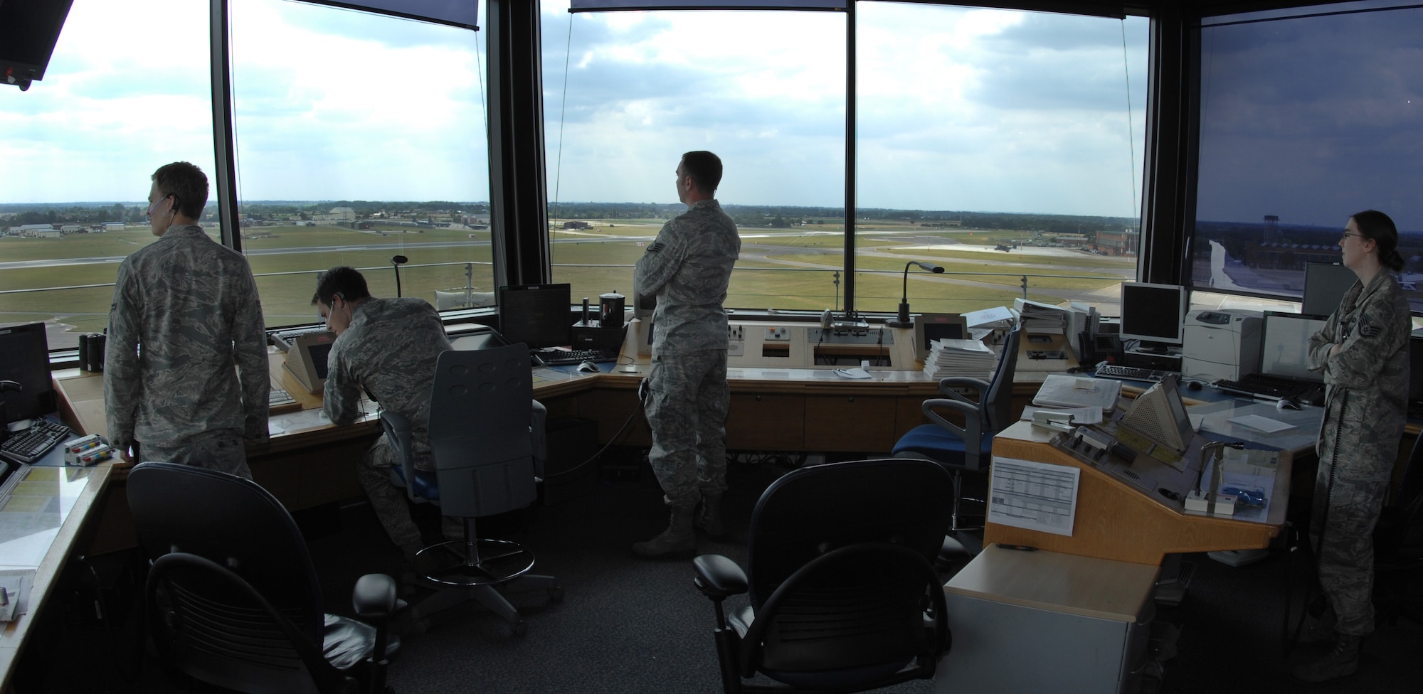 U.S. Air Force air traffic controllers from Team Mildenhall scan the runway for debris, vehicles and wildlife Aug. 7, 2013, on RAF Mildenhall, England. Keeping the runway clear is essential in keeping Air Force assets safe. A bird, if sucked into an engine, can have catastrophic consequences. (U.S. Air Force photo by Airman 1st Class Dillon Johnston/Released)