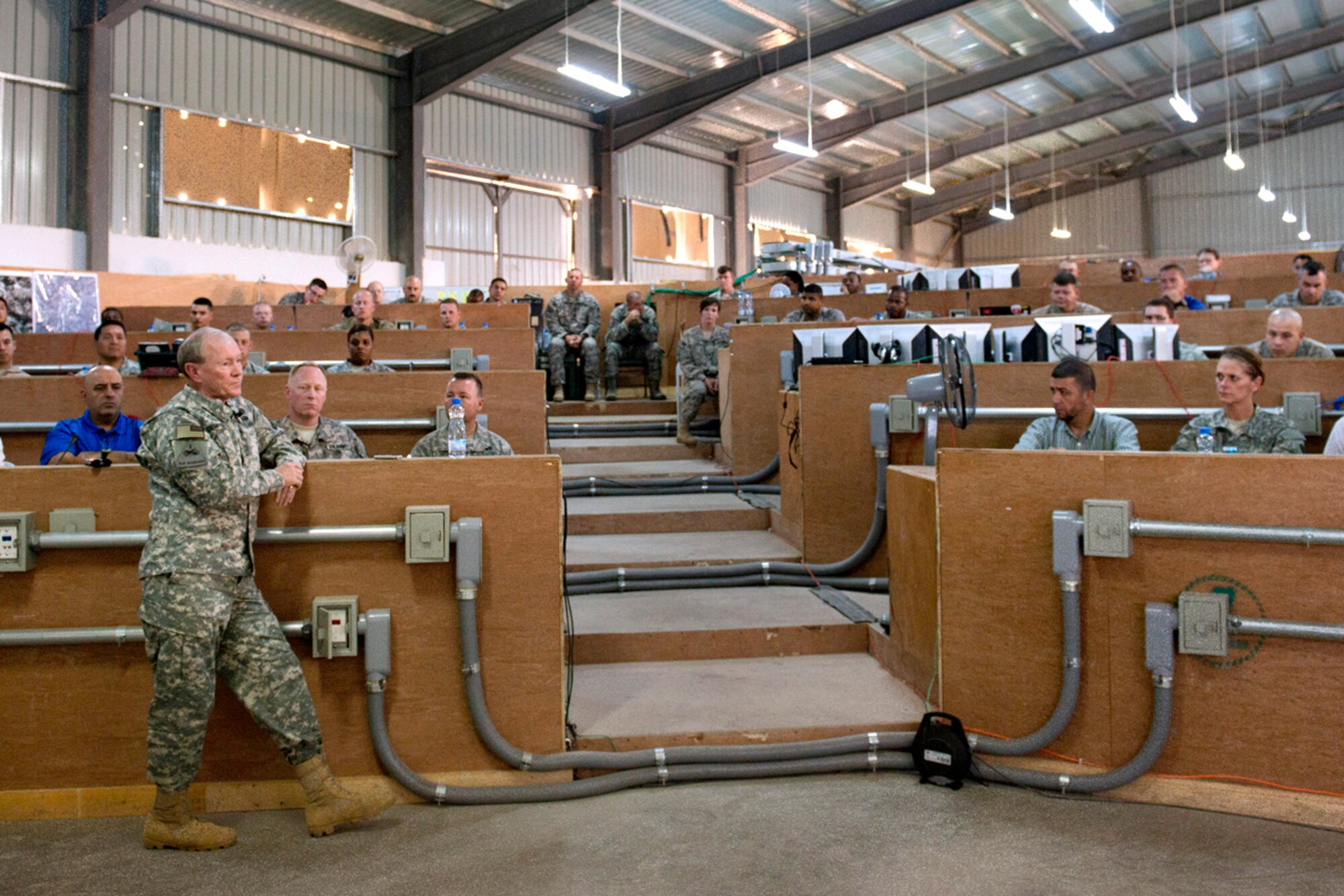 U.S. Army Gen. Martin E. Dempsey, chairman of the Joint Chiefs of Staff, talks to U.S. and Jordanian troops at a military facility on the outskirts of Amman, Jordan, Aug. 15, 2013. (DOD photo by D. Myles Cullen/Released)
