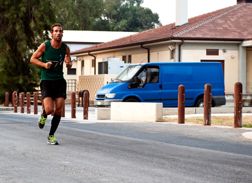Floris Kolenberg paces himself during the 5K of a sprint triathlon Aug. 17, 2013, at Incirlik Air Base, Turkey. The sprint triathlon was held to encourage a fitness lifestyle and increase base morale. (U.S. Air Force photo by Senior Airman Daniel Phelps/Released)