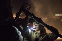 U.S. Marine Lance Cpl. Hailey Carrol with Transportation Support Company, Combat Logistics Regiment 2, refuels a logistics vehicle system replacement after conducting a combat logistics patrol (CLP) to Forward Operating Base Shukvani, Helmand province, Afghanistan, Aug. 13, 2013. Marines conducted the CLP for maintenance and supply operations in support of Regional Command (Southwest). (U.S. Marine Corps photo by Sgt. Anthony L. Ortiz / Released)