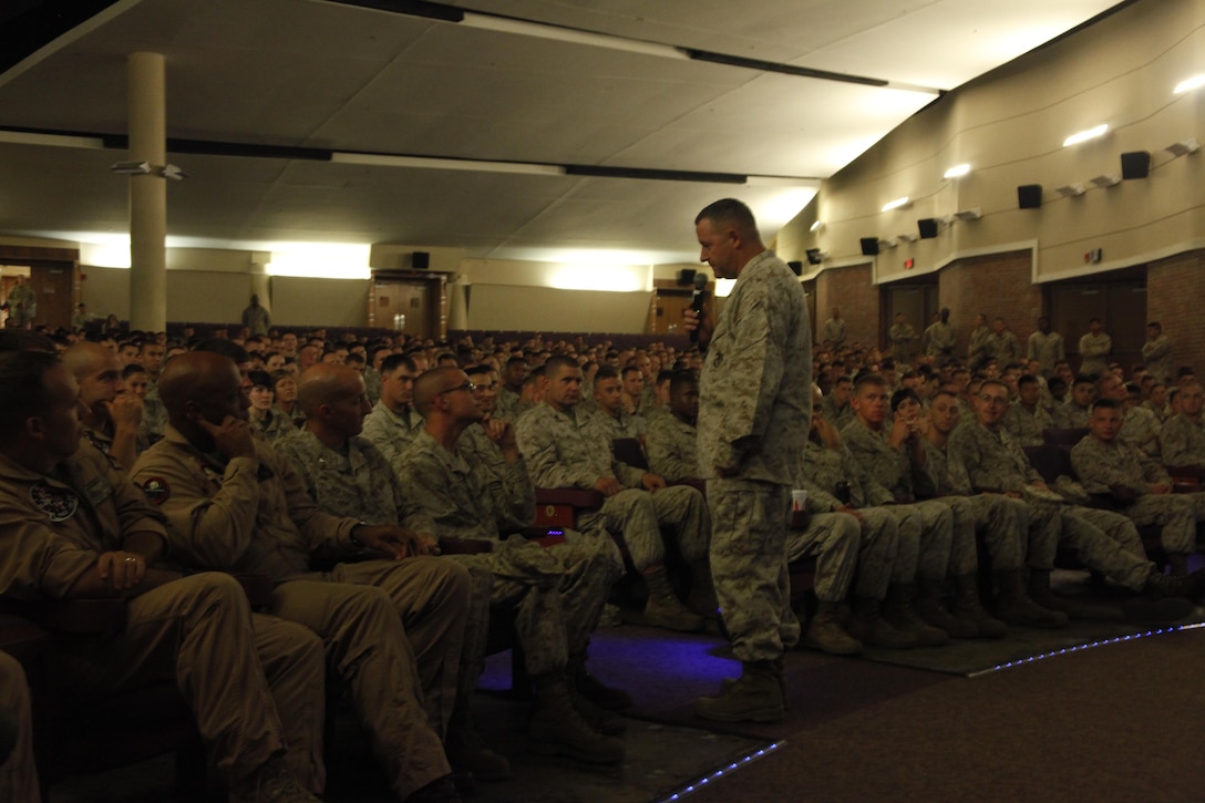 Col. Robert Sofge, commanding officer of Marine Aircraft Group 14, talks to Marines and Sailors about the importance of preventing sexual assault at the Cherry Point theater Aug. 15. The training gave Sofge a chance to look his service members in the eyes and personally relay his and the Marine Corps’ views on sexual assault. Sofge wanted the service members to walk away from the training with two specific details in mind. First, if a Marine is a victim of a sexual assault, they must have the moral courage and trust in their chain of command to come forward. Second, Marines and Sailors must step up and eliminate sexual assault within all ranks of the Marine Corps. Defense Secretary Chuck Hagel announced seven new initiatives to strengthen and standardize the department’s sexual assault prevention and response effort Aug. 15. In a memo to the field, Hagel called elimination of sexual assault in the military one of the department’s top priorities.

