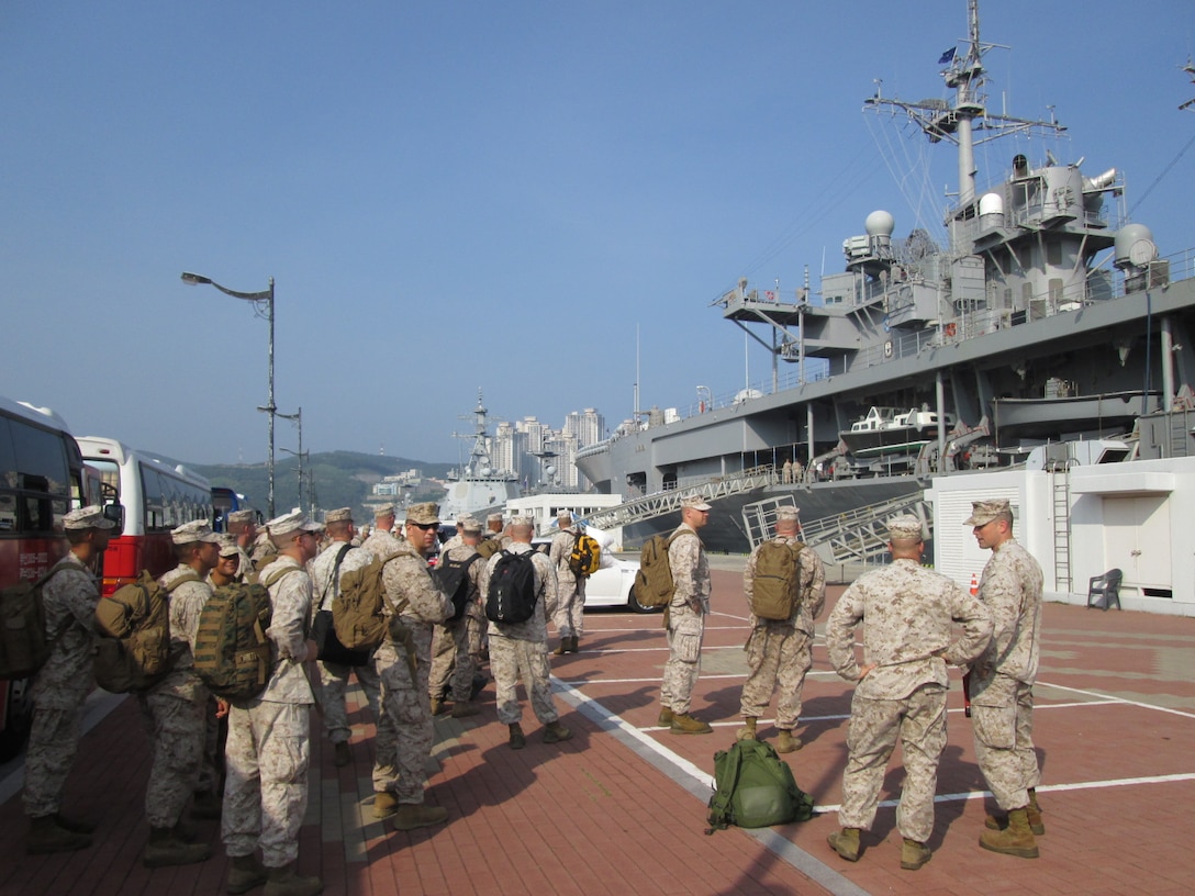 Marines of III Marine Expeditionary Force prepare to board the USS Blue Ridge Aug. 17, in preparation for exercise Ulchi Freedom Guardian 2013.  The Marines flew from Okinawa, Japan, to join the exercise aboard ship.  Other III MEF Marines are participating from several locations across Japan and the Republic of Korea.  UFG is carried out in the spirit of the Republic of Korea and U.S. Mutual Defense Treaty signed on Oct. 1, 1953, and further contributes to training and enabling of the Republic of Korean military taking the lead for their combined defense in 2015.