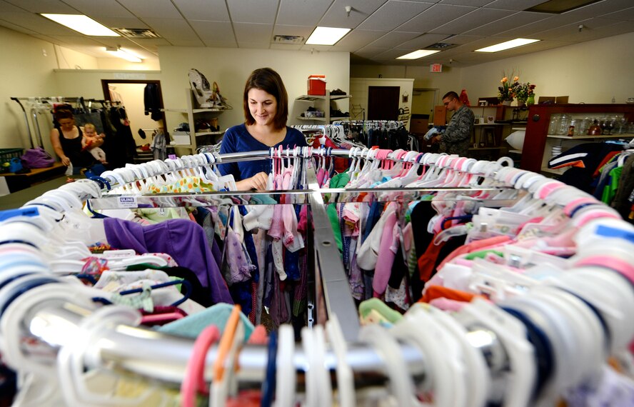Tiffany Bruce, wife of Airman 1st Class Galen Bruce, with the 71st Logistics Readiness Squadron, browses the Airman’s Attic for her baby-on-the-way Aug. 21 in the Airman’s Attic at Vance Air Force Base, Okla. The Airman’s Attic is volunteer-run and offers free household items to Airmen ranks E-5 and below. Donated uniforms are also available to military members of any rank. (U.S. Air Force photo/ Senior Airman Frank Casciotta)
