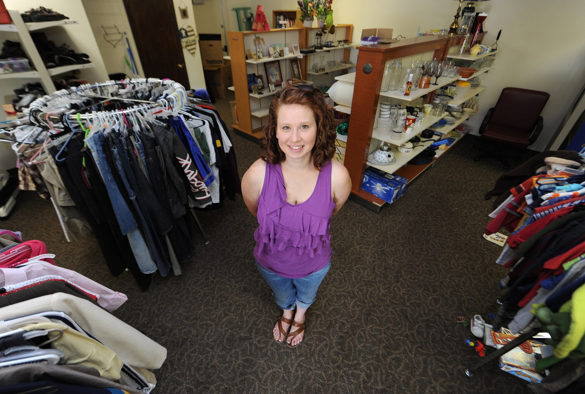Chelsey Gillespie, wife of Senior Airman Evan Gillespie with the 71st Communications Squadron, reopened the Airman’s Attic after it was closed for nearly five months at Vance Air Force Base, Okla. The Airman’s Attic is volunteer-run and offers free household items to Airmen ranks E-5 and below. Donated uniforms are also available to military members of any rank. (U.S. Air Force photo/ Senior Airman Frank Casciotta)