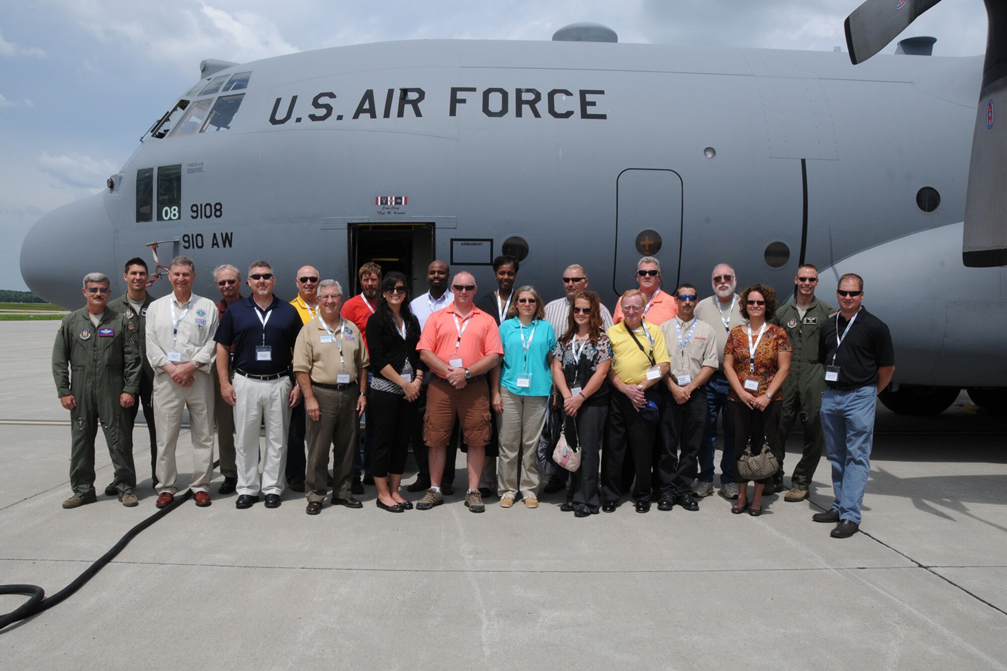 YOUNGSTOWN AIR RESERVE STATION, Ohio – A group of employers and representatives of Ohio Employer Support of the Guard and Reserve (ESGR) stand with 910th Airlift Wing aircrew members in front of a C-130 Hercules cargo aircraft on the flightline here, August 2, 2013. The group of employers attended the inaugural Joint Employer Awareness Event, co-hosted by the 910th, the Ohio National Guard and Ohio ESGR. The two-day event gave employers of Air Force Reservists and Guardsmen the opportunity to get an up-close look at both Camp Ravenna and YARS. The event also gave the employers a better understanding of the mission that their employees carry out as members of the U.S. Armed Forces. U.S. Air Force photo by Senior Airman Rachel Kocin