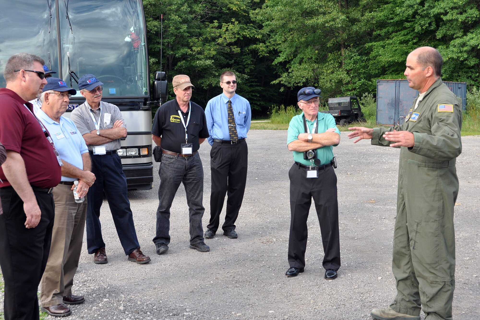 CAMP RAVENNA, Ohio – Air Force Reserve Senior Master Sgt. Bryan Watson, a loadmaster assigned to the 910th Airlift Wing’s 773rd Airlift Squadron, briefs a group of employers about airdrop operations at the Slagle Drop Zone here, August 1, 2013. The group of employers attended the inaugural Joint Employer Awareness Event, co-hosted by the 910th, the Ohio National Guard and Ohio Employer Support of the Guard and Reserve (ESGR). The two-day event gave employers of Air Force Reservists and Guardsmen the opportunity to get an up-close look at both Camp Ravenna and YARS. The event also gave the employers a better understanding of the mission that their employees carry out as members of the U.S. Armed Forces. U.S. Air Force photo by Master Sgt. Bob Barko Jr.