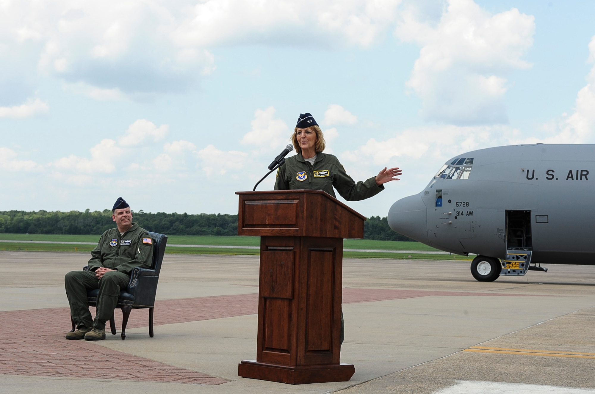 Maj. Gen. Margaret Woodward, director of the Air Force Sexual Assault Prevention and Response Office, spoke after flying in Team Little Rock’s newest C-130J Aug. 20, 2013, at Little Rock Air Force Base, Ark. Woodward said that the U.S. military could not maintain our forward operating bases without the short-field landing and precision airdrop capabilities the C-130 brings to the fight. (U.S. Air Force photo by Airman 1st Class Cliffton Dolezal)