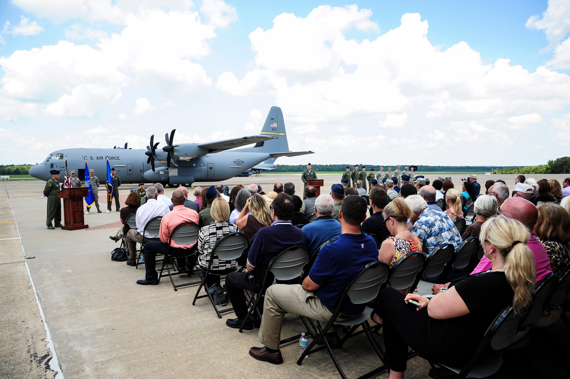 Community and Team Little Rock members listen as Col. Scott Brewer, the 314th Airlift Wing commander, speaks during the C-130J arrival ceremony Aug. 20, 2013 at Little Rock Air Force Base, Ark. C-130J’s have been operating at Little Rock Air Force base since March 2004. (U.S. Air Force photo by Airman 1st Class Kaylee Clark)