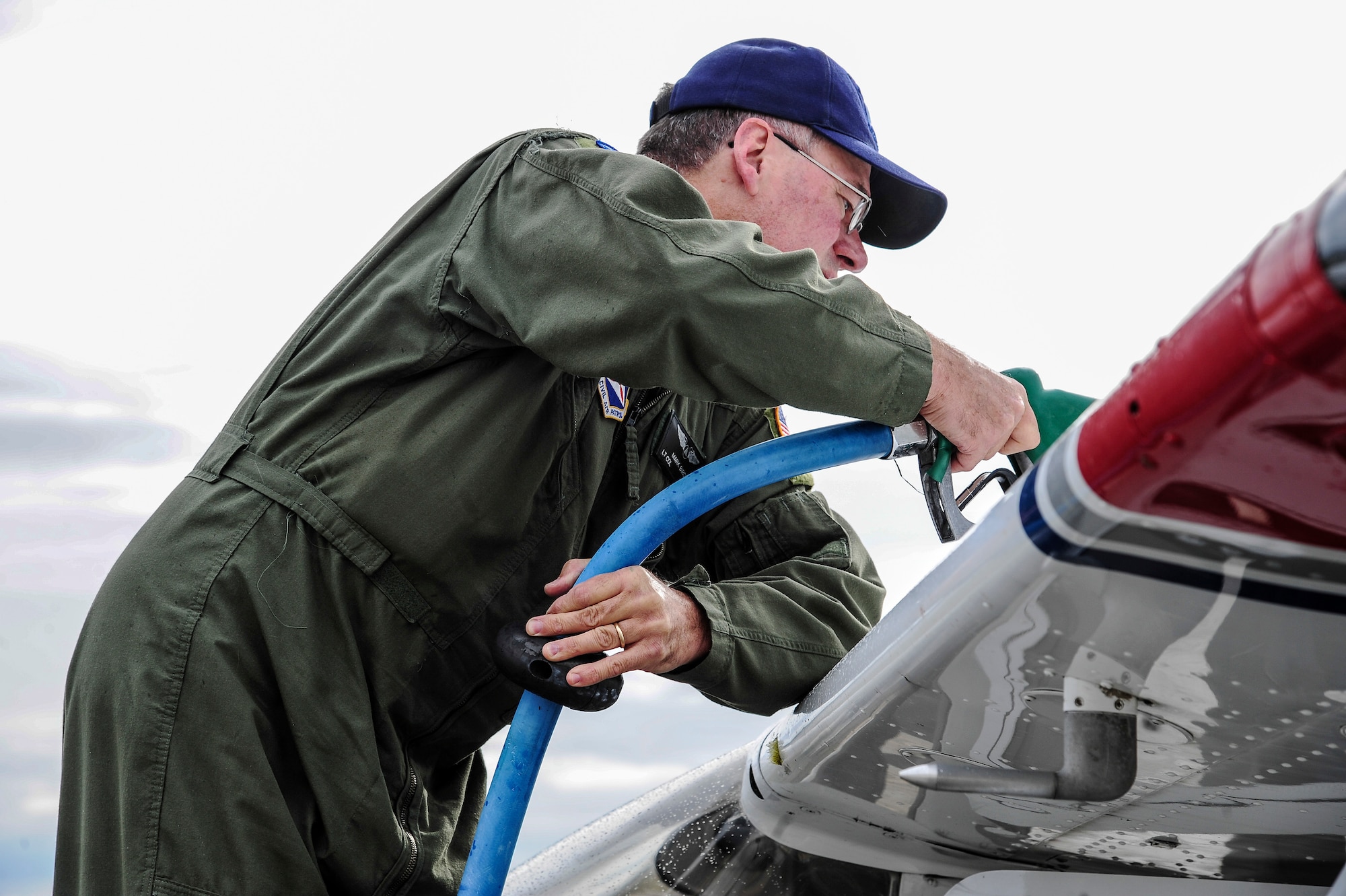 Mark Biron, Civil Air Patrol 71st Composite Squadron member, refuels a CAP Cessna 172 after a RED FLAG-Alaska 13-3 sortie Aug. 19, 2013, Eielson Air Force Base, Alaska. The 71st CS flew multiple sorties during RF-A 13-3, simulating low-flying threats and “attacking” various locations throughout the Joint Pacific Alaska Range Complex. (U.S. Air Force photo by Senior Airman Zachary Perras)