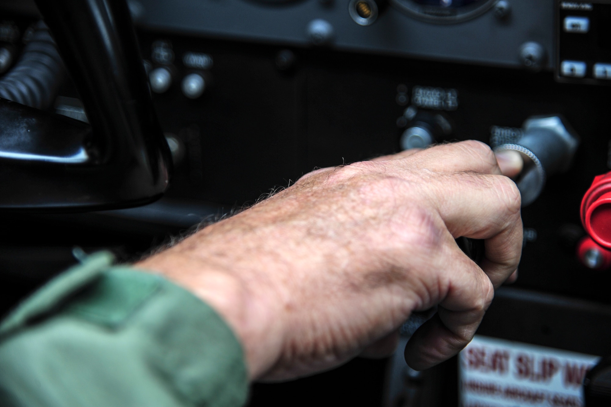 Mark Biron, Civil Air Patrol 71st Composite Squadron member, controls the throttle of a CAP Cessna 172 during a RED FLAG-Alaska 13-3 sortie Aug. 19, 2013. Eielson Air Force Base, Alaska, hosts the 71st CS, which participates in various exercises such as RF-A to assist participating units. (U.S. Air Force photo by Senior Airman Zachary Perras/Released)