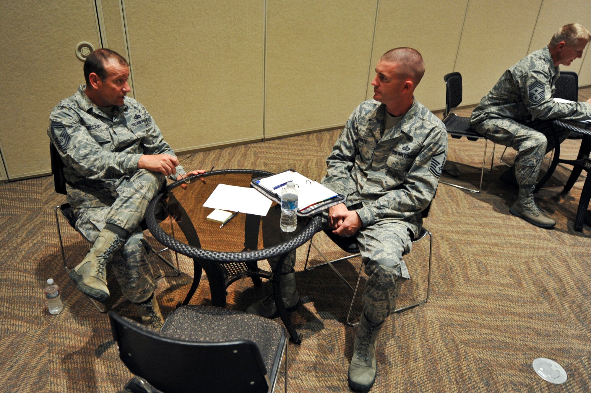 Chief Master Sgt. Howard Bellamy III, 460th Security Forces Squadron, left, discusses career development with Master Sgt. Kristopher Coats, 460th Comptroller Squadron, at Buckley’s first ever speed mentoring Aug. 15, 2013, at the Leadership Development Center on Buckley Air Force Base, Colo. The event provided Air Force master sergeants with the opportunity to speak with chiefs from a variety of career fields who represented a blend of components that included active-duty, Guard and Reserve.  (U.S. Air Force photo by Airman 1st Class Riley Johnson/Released)