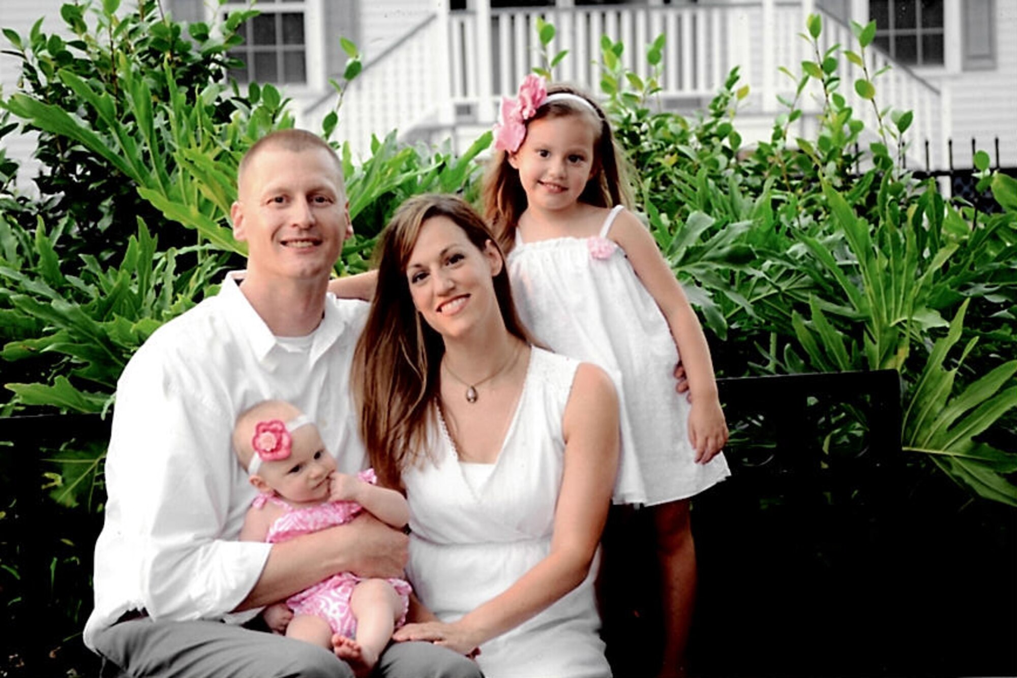 Tech. Sgt. Gareth Davis, sits with his family. Davis is an instructor supervisor in the 335th Training Squadron. (Courtesy photo)