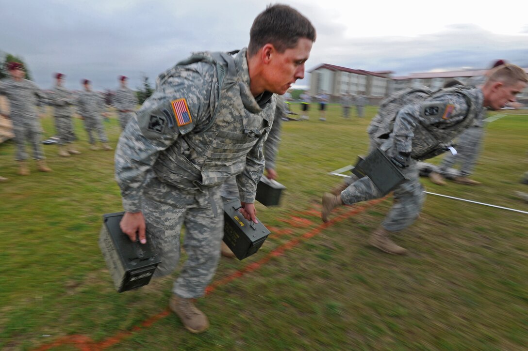 Army Sgt. Travis Hansen takes off from the starting line during a shuttle run for his unit's Best Soldier Competition on Joint Base Elmendorf-Richardson, Alaska, Aug. 13, 2013. Hansen is assigned to the 6th Engineer Battalion Combat, Airborne.