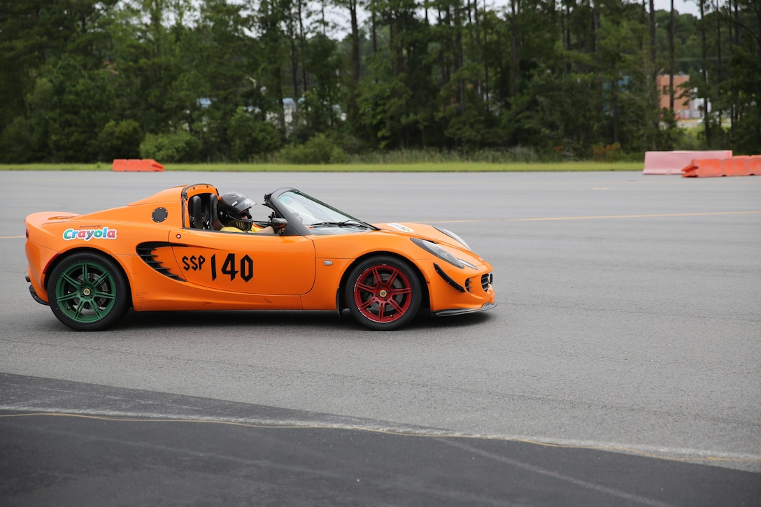 A participant of the Sports Car Club of America autocross event negotiates the safety course Saturday on the air station flight line. The autocross event takes place four times a year, is customized to promote safety on the road and allows participants a chance to let loose while racing time-trials in vehicles ranging from station wagons to sports cars.