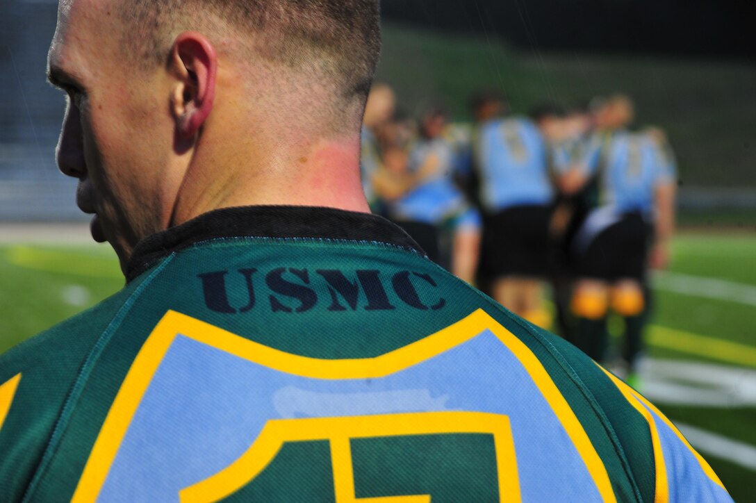 A member of the Quantico Hooligans Rugby Football Club observes his team on the field at Butler Stadium aboard Marine Corps Base Quantico on Aug. 22, 2013. The team played the 1st Battalion Royal Regiment of Scotland during a pre-season game, called a skirmish. 
