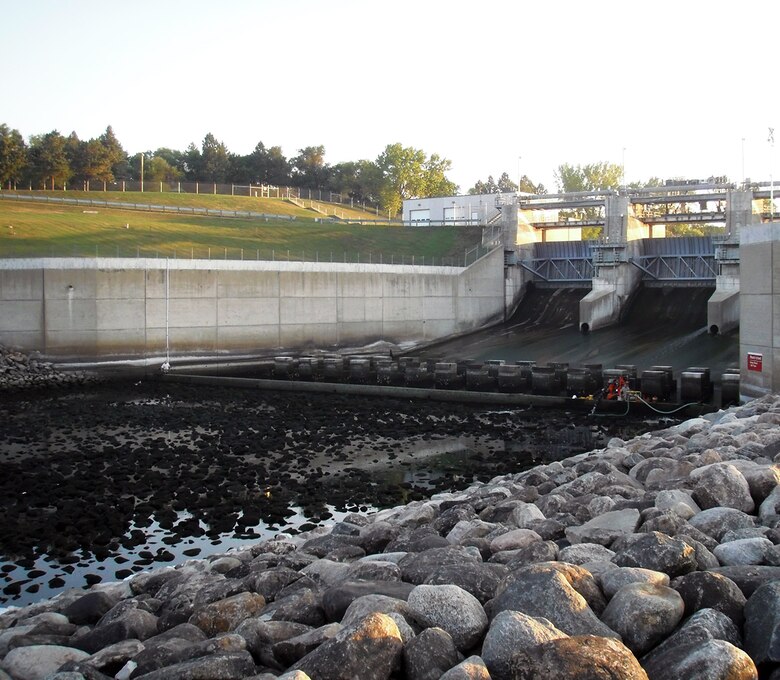 High and dry! You don’t see this that very often. Outflows from Baldhill Dam, near Valley City, N.D., were cut from 850 cubic feet per second to 13 cfs so that inspectors could complete a periodic inspection of the structure this week. The Corps’ comprehensive periodic inspections are performed every five years as part of its dam safety program. Routine or annual inspections are conducted at the site each year but do not involve dewatering the stilling basin. http://bit.ly/18MlfbO