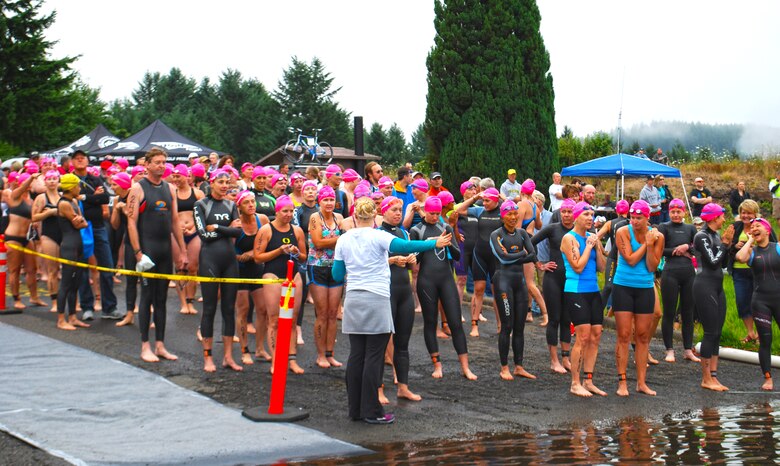 Swimmers get ready to enter Cottage Grove Lake at the Lakeside Boat Ramp.