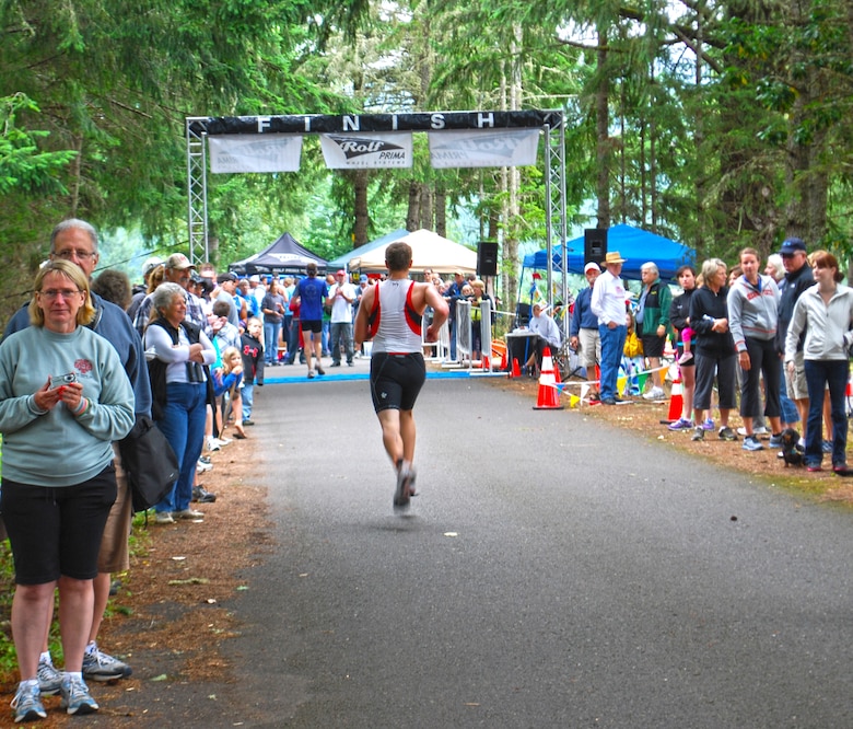 Hundreds of spectators attend the “Tri at the Grove” to cheer on their friends and family members.