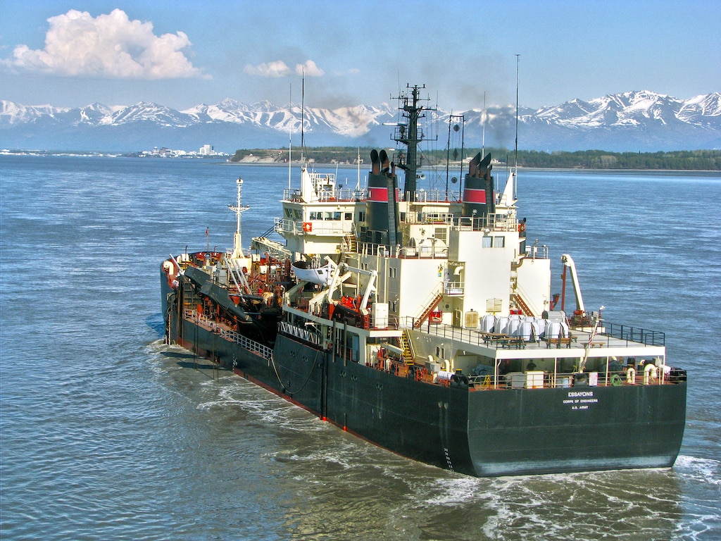 Portland District’s dredge Essayons and its crew spent part of their summer in Alaska, dredging in the Cook Inlet navigation channel about six miles from Anchorage. The federal navigation channel was constructed in 2000 and is essential to ship traffic entering and leaving the Port of Anchorage. Before the Essayons arrived, sand in the channel reduced depths by eight to ten feet above the authorized depth. The ship removed more than two and a half million cubic yards of material, nearly 300,000 truck loads, from the navigation channel in just 33 days.

 

The Essayons is one of only two Corps-owned dredges on the West Coast. The ship was built in 1983 and designed to dredge anywhere in the world. Its work typically takes it from Hawaii to the Pacific Northwest to Alaska. Getting the Essayons to Alaska for the 2013 season required considerable team effort across several Corps districts.
