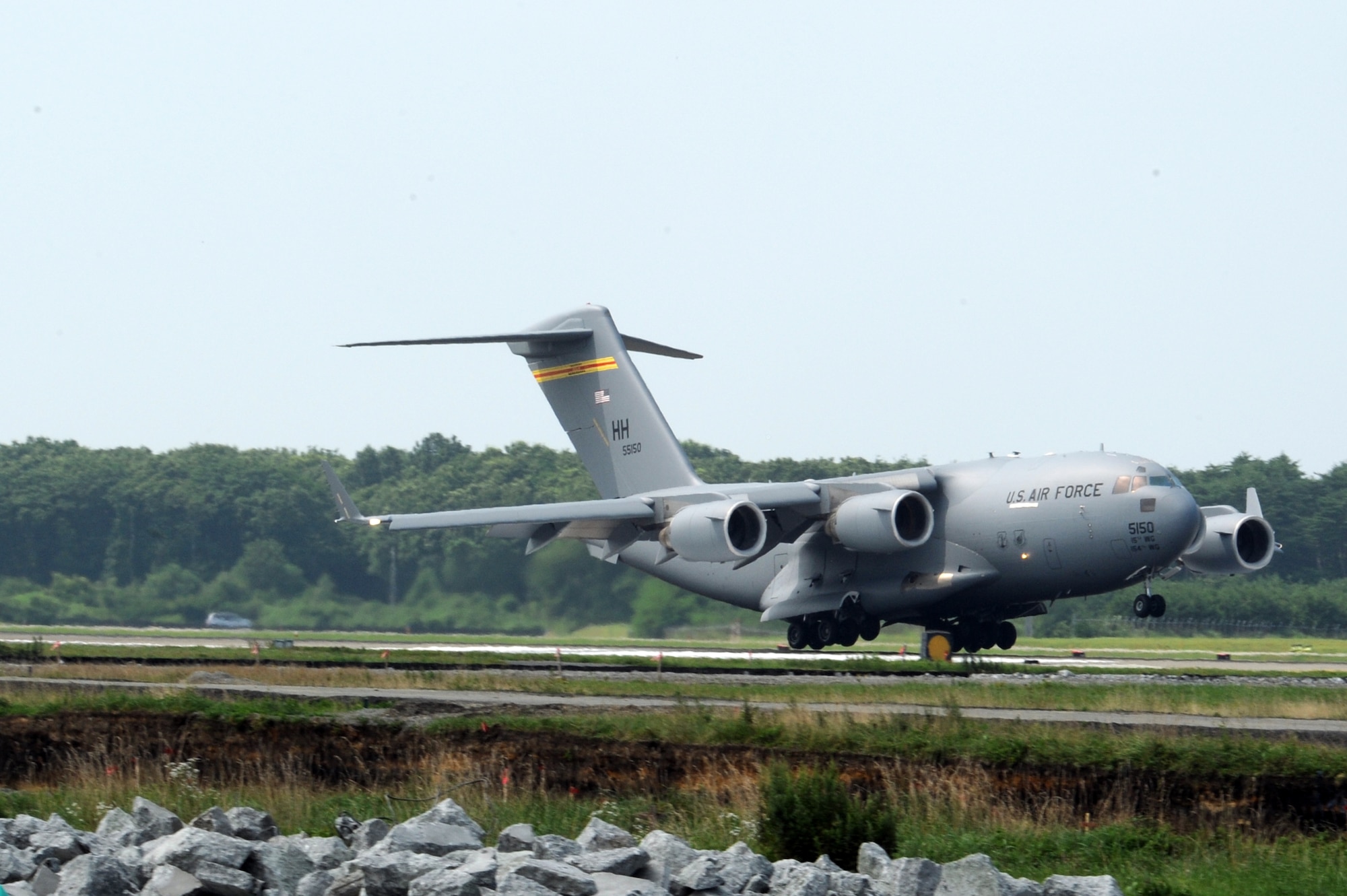 A C-17 Globemaster III carrying a Joint Deployable Electronic Warfare Range arrives at Misawa Air Base, Japan, Aug. 11, 2013. The JDEWR serves as a Surface to Air missile site that aids 35th Fighter Wing pilots during training for their mission of Suppression of Enemy Air Defenses. (U.S. Air Force photo/Senior Airman Derek VanHorn)