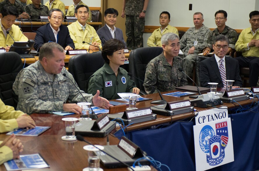 SEOUL, South Korea - Republic of Korea President Park Geun-Hye met with U.S., ROK and United Nations Sending States military leaders during a visit to CP TANGO Aug. 22.  Gen. James Thurman, commander, United Nations Command, Combined Forces Command and U.S. Forces Korea, briefs President Park on Ulchi Freedom Guardian, an annual computer-simulation command post exercise led by the ROK – US Combined Forces Command. (From left to right) Thurman, Park, ROK Gen. Kwon Oh-Sung, deputy commander, CFC, and U.S. Ambassador to the Korea Sung Kim, discuss the annual training exercise. UFG is designed to ensure readiness to defend the Republic of Korea and sustain the capabilities that strengthen the ROK-U.S. Alliance. Nearly 30,000 U.S. service members stationed in Korea, along with approximately 3,000 coming from off-peninsula, are participating in the exercise with military, civil and government personnel from the Republic of Korea, and personnel from the United Nations Command Sending States of Australia, Canada, Denmark, France, Netherlands, New Zealand, Norway and the United Kingdom. (Photo by Sgt. Brian Gibbons, USFK/PAO)