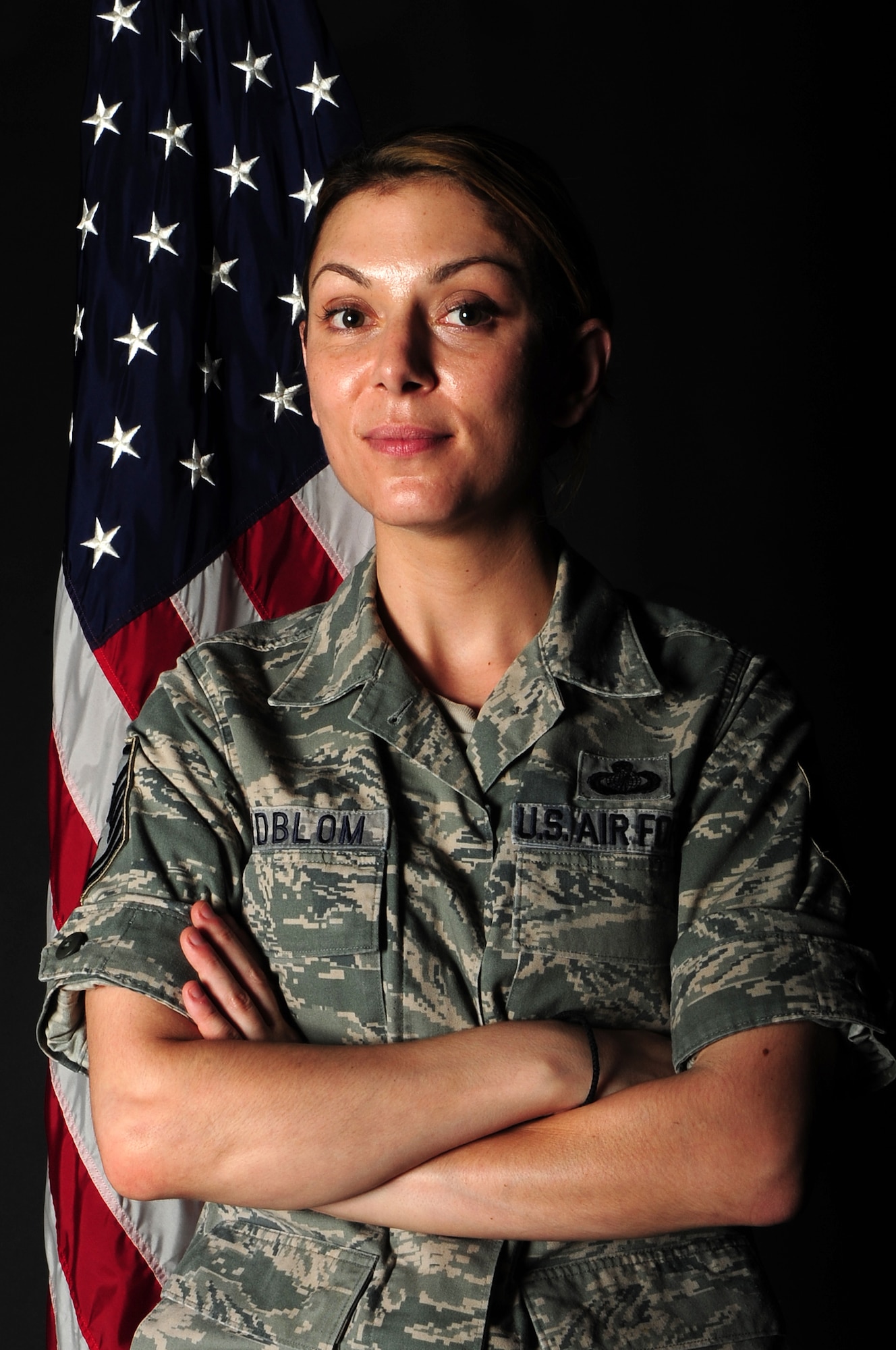 U.S. Air Force Master Sgt. Natasha Lindblom, 355th Comptroller Squadron Financial Management Flight chief, volunteers to teach a citizenship course at Davis-Monthan Air Force Base, Ariz., Aug. 22, 2013. Pima Community College offers a free citizenship test prepartion course. (U.S. Air Force photo by senior Airman Camilla Elizeu/released)