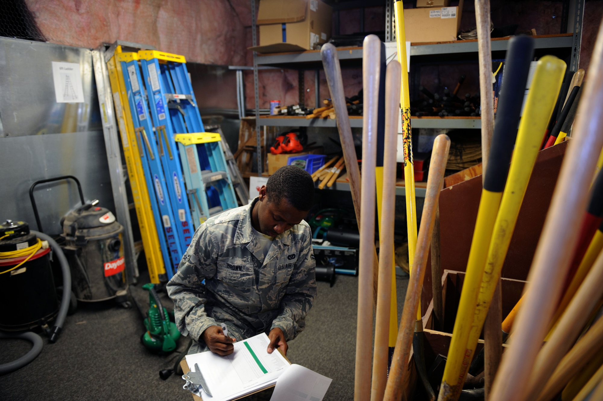 U.S. Air Force Airman 1st Class Roderick Brown, 355th Civil Engineer Squadron operations management, takes inventory at the 355th CES Self-Help Store at Davis-Monthan Air Force Base, Ariz., Aug. 20, 2013. Base building facility managers can check out items such as rakes, drills and pressure washers for the routine maintenance and upkeep of their facilities. (U.S. Air Force photo by Airman 1st Class Saphfire Cook/Released)