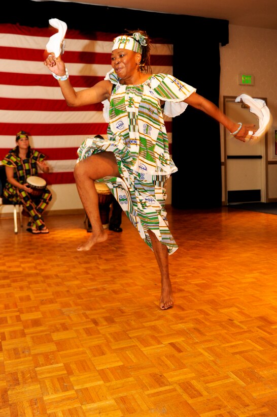 VANDENBERG AIR FORCE BASE, Calif. – Sadie Lee, mother of Master Sgt. Xzabrielle Lee, 30th Logistics Readiness Squadron logistics planner, performs an authentic Nigerian African dance during this year’s annual Cultural Diversity Day at the Pacific Coast Club here Wednesday, Aug. 21, 2013. Vandenberg’s Diversity Day combined all annual cultural observances into one gala event of food, music, dance and displays. (U.S. Air Force photo/Senior Airman Lael Huss)