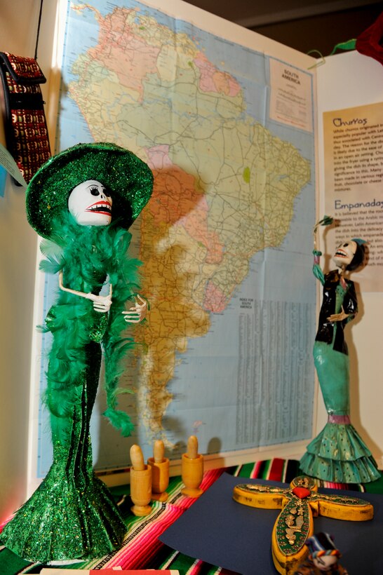 VANDENBERG AIR FORCE BASE, Calif. – Two well-dressed dolls flank the map of South America at the S. American Culture booth during this year’s annual Diversity Day at the Pacific Coast Club here Wednesday, Aug. 21, 2013. Diversity Day is the culmination of all the Department of Defense recognized monthly observances into one event. (U.S. Air Force photo/Senior Airman Lael Huss)