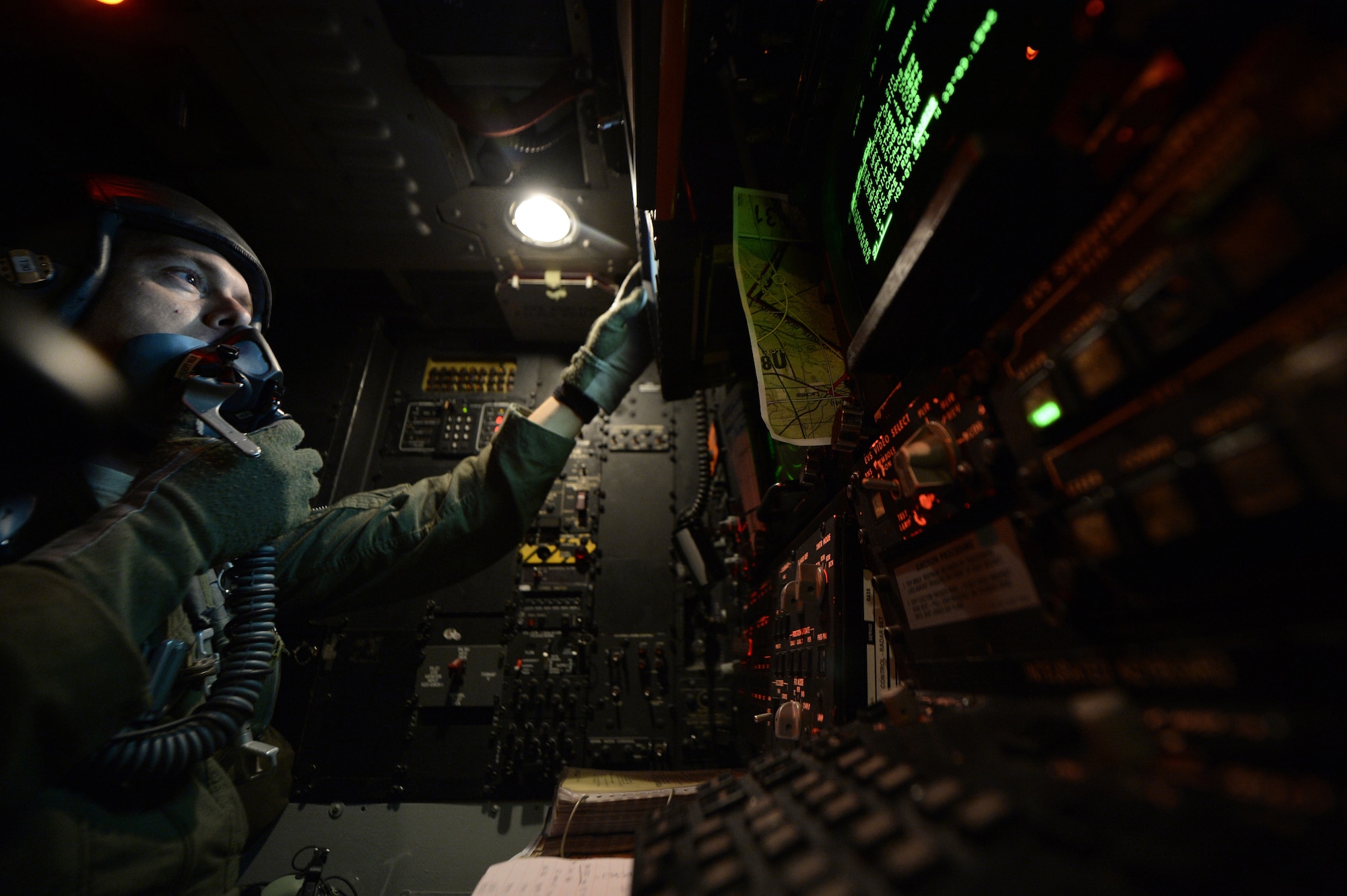 Maj. Chris Weir, 96th Bomb Squadron B-52H Stratofortress navigator, navigates a B-52 during a Green Flag-East training mission over Fort Polk, La., Aug. 21, 2013. GF-E is a realistic air-land integration combat training exercise meant to replicate deployed warfare conditions. Weir's hometown is Tyler, Texas. (U.S. Air Force photo/Staff Sgt. Jonathan Snyder)