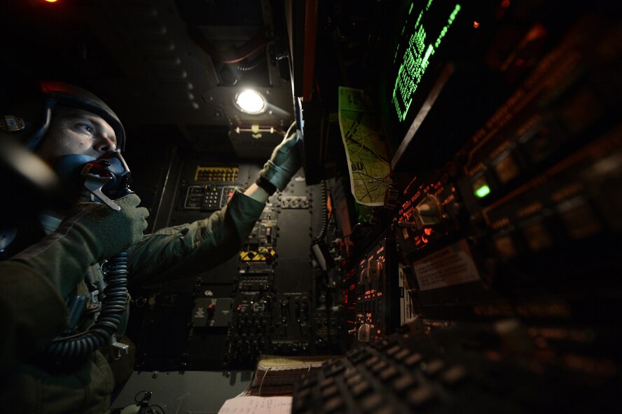 Maj. Chris Weir, 96th Bomb Squadron B-52H Stratofortress navigator, navigates a B-52 during a Green Flag-East training mission over Fort Polk, La., Aug. 21, 2013. GF-E is a realistic air-land integration combat training exercise meant to replicate deployed warfare conditions. Weir's hometown is Tyler, Texas. (U.S. Air Force photo/Staff Sgt. Jonathan Snyder)