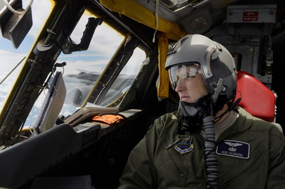 1st Lt. Reed Elsbernd, 20th Bomb Squadron B-52H Stratofortress pilot, scans the horizon during a Green Flag-East training mission over Fort Polk, La., Aug. 21, 2013. The B-52 is capable of flying at high subsonic speeds at altitudes up to 50,000 feet. It can carry a variety of weapons including nuclear and precision guided conventional ordnance with worldwide precision navigation capability. Elsbernd's hometown is Macon, Ga. (U.S. Air Force photo/Staff Sgt. Jonathan Snyder)