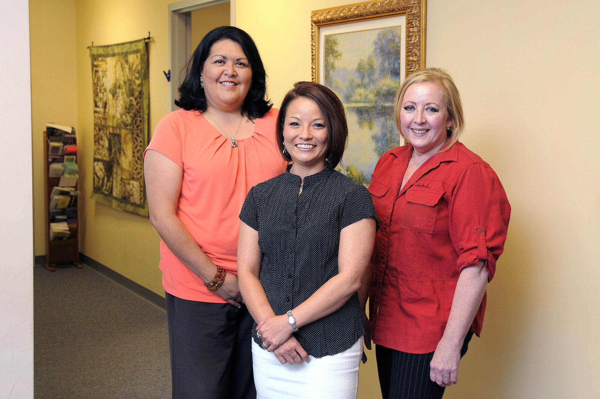 The Academy’s Sexual Assault Prevention and Response victim’s advocates, Sandra Cervantes (left) and Layla Hernandez, pose with Teresa Beasley (right), the Academy’s Sexual Assault Response coordinator, Tuesday. (U.S. Air Force Photo/Raymond McCoy)
