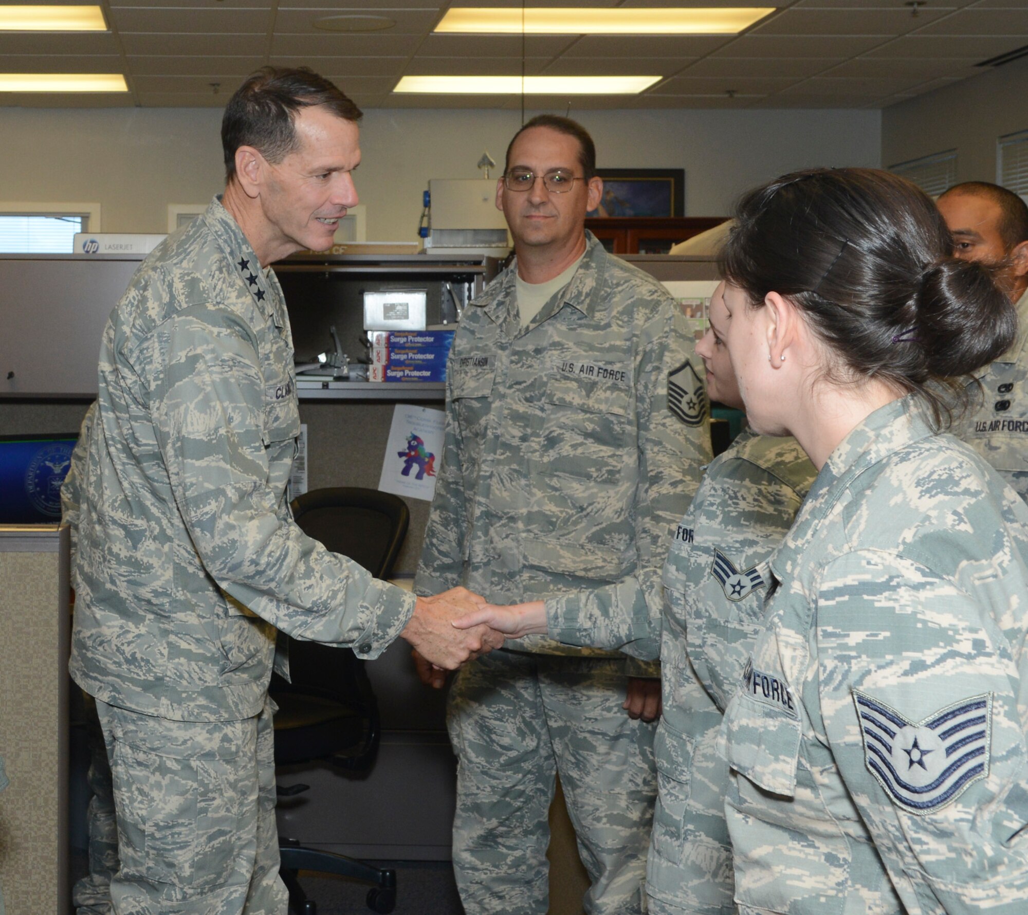 Lt. Gen. Stanley Clarke, director, Air National Guard meet and greet with the Airmen from the 136th Communications Flight, Texas Air National Guard during his site visit at Naval Air Station Fort Worth Joint Reserve Base, Aug. 21, 2013. He challenged each of the Airmen to serve with distinction and mentor their fellow wingman. (Air National Guard photo by Senior Master Sgt. Elizabeth Gilbert/released)