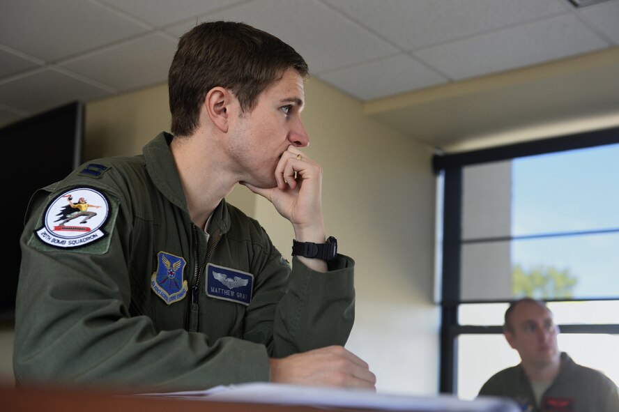 Capt. Matthew Gray, 20th Bomb Squadron B-52H Stratofortress pilot, listens to a pre-flight mission brief for participation in Green Flag-East on Barksdale Air Force Base, La., Aug. 21, 2013. GF-E is a realistic air-land integration combat training exercise meant to replicate deployed warfare conditions. Gray’s hometown is Fort Thomas, Ky. (U.S. Air Force photo/Staff Sgt. Jonathan Snyder)