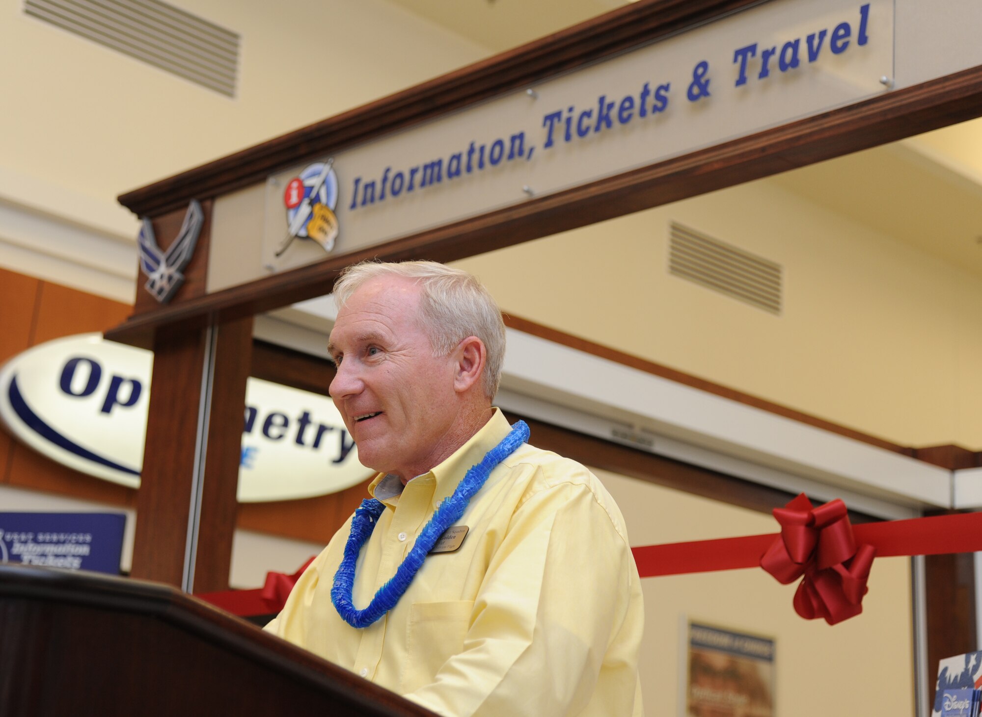 Tom Golden, 81st Force Support Squadron community services flight chief, delivers welcoming remarks during the Information, Tickets and Travel kiosk ribbon cutting ceremony Aug. 22, 2013, at the base exchange, Keesler Air Force Base, Miss. The kiosk is part of a test at six bases for the next year. (U.S. Air Force photo by Kemberly Groue)