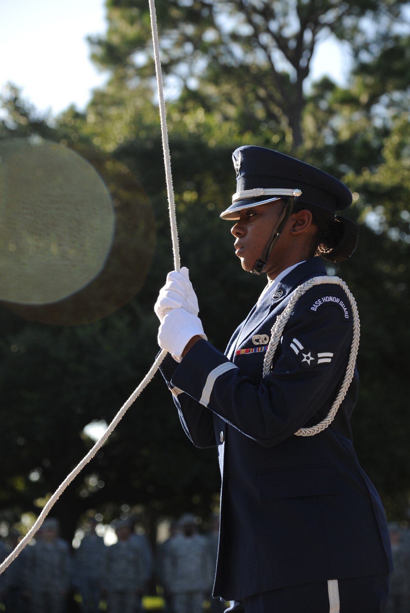 Airman 1st Class Shadey Bennett, Keesler Honor Guard, raises the Commander-in-Chief’s Installation Excellence award flag in front of the 81st Training Wing headquarters building Aug. 22, 2013, at Keesler Air Force Base, Miss.  Keesler was presented the award in April, 2013. (U.S. Air Force photo by Kemberly Groue)