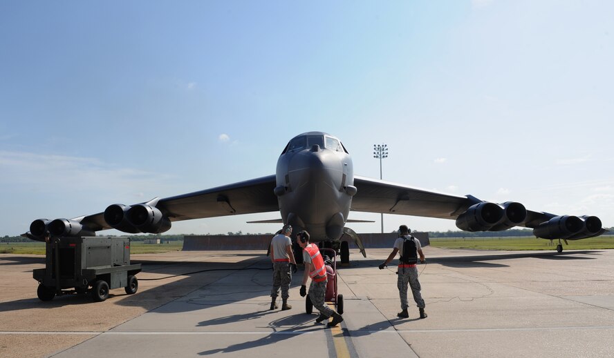 Crew chiefs from the 96th Aircraft Maintenance Unit prepare a B-52H Stratofortress for take-off on Barksdale Air Force Base, La., Aug. 21, 2013. Ground crews work day and night, in extreme heat and cold, to ensure the aircraft is ready for planned flying events. (U.S. Air Force photo/Senior Airman Benjamin Gonsier)