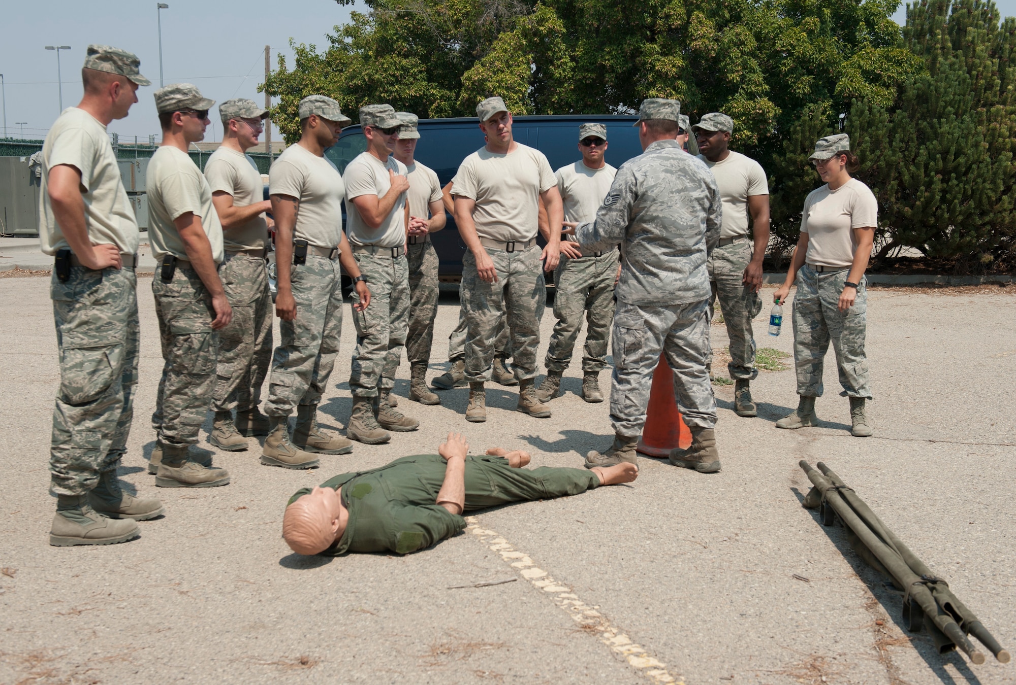U.S. Air Force Staff Sgt. Robert Fulton, 366th Civil Engineering Squadron water and fuel systems maintenance, instructs a team on the challenge they will be facing Aug. 15, 2013, at Mountain Home Air Force Base, Idaho. The challenge was to correctly provide first aid to a manikin and answer questions.  (U.S. Air Force photo by Airman 1st Class Brittany A. Chase/released)