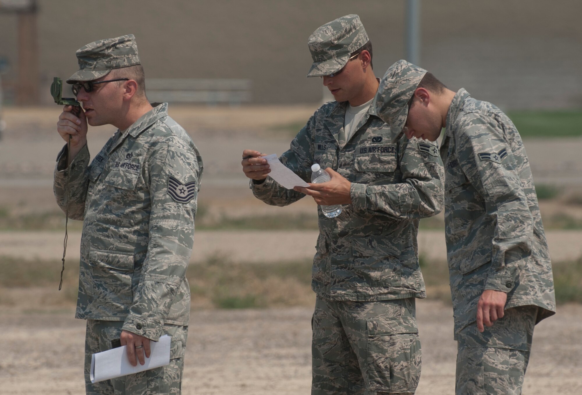 U.S. Air Force Tech Sgt. Mark Jurek, 366th Civil Engineering Squadron electrical sub activity management plan manager, operates a compass in a land navigation event Aug. 15, 2013, at Mountain Home Air Force Base, Idaho. The land navigation event was one of six events in the engineers’ challenges set up by 366th CES. (U.S. Air Force photo by Airman 1st Class Brittany A. Chase/released)