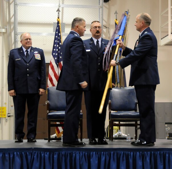 Col. Kevin Derickson, right, assumes command of the 193rd Special Operations Maintenance Group, Middletown, Pa., Aug. 17. Prior to becoming the commander of the 193rd SOMXG, Col. Derickson was the commander of the 193rd Special Operations Aircraft Maintenance Squadron. The presiding officer was Col. John Dickinson, 193rd Special Operations Wing commander. (U.S. Air National Guard photo by Tech. Sgt. Culeen Shaffer/Released)