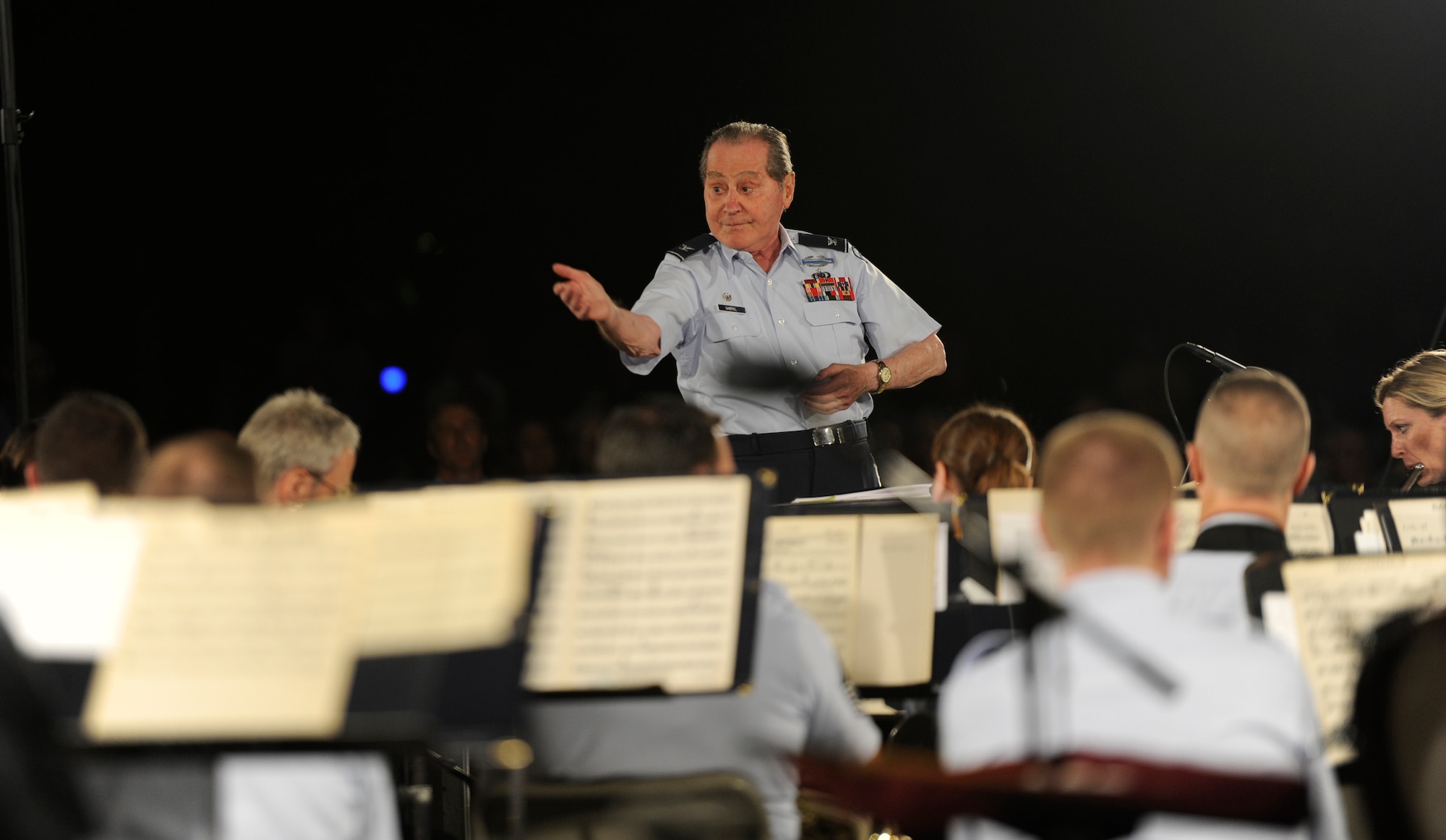 Retired Col. Arnold D. Gabriel, United States Air Force Band Conductor Emeritus, finishes conducting his performance of Mascagni’s “Intermezzo Sinfonica” during the United States Air Force Band concert, “A Night at the Opera,” in Washington, D.C., Aug. 16, 2013. An internationally renowned conductor, Gabriel led the USAF Band for 21 years. (U.S. Air Force photo/Airman 1st Class Nesha Humes)